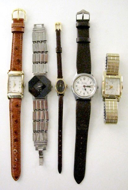 Group of 5 Wrist Watches: Group of 5 Wrist Watches: 1.) Bulova Accutron RR approved, Quartz. White dial with black and red features, day and date at 3. Not opened. Presentation on back. Circa 1979. 2.) Bulova 7AA, 21J, stem wi