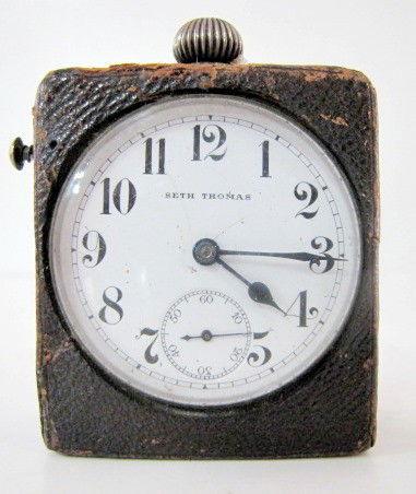 Seth Thomas No.819162 Pigeon Timer: Seth Thomas No.819162 Pigeon Timer: hand held, heavy with leather wrapped case and display back. The clock part is working. (The stop part seems to not be working. Shows use.) 2 1/2" x 1 7/8" x 1 1/8"