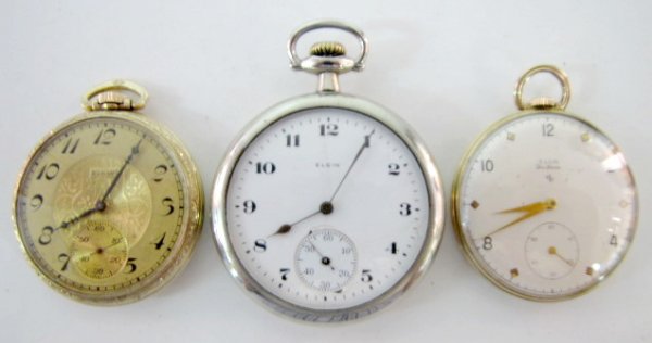 Group of 3 Elgin Pocket Watches: Group of 3 Elgin Pocket Watches: 1.) 15J 12S OF SW DMK, serial no.27950444. In a yellow snap on Keystone 10K GF case, numbered 9502433. The fancy 2 tone gold dial looks good. (Case is scratched.) Runn