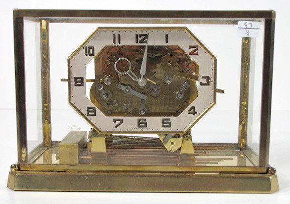 Cuckoo Clock Mfg. Co. Germany Chime Clock: Cuckoo Clock Mfg. Co. Germany Chime Clock: made in Germany, serial no.170722. The strike is on 8 straight rods, playing Westminster & Winchester chimes. The movement is skeletonized behind the 6 1/2" 