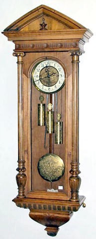 Gustav Becker 3 Wt. Hanging Regulator: Gustav Becker 3 Wt. Hanging Regulator: serial no.190928; 8 day time with strike on 2 straight rods. The 7" ivorine dial has an engraved brass center. The pendulum ball is supported on a wooden rod, it