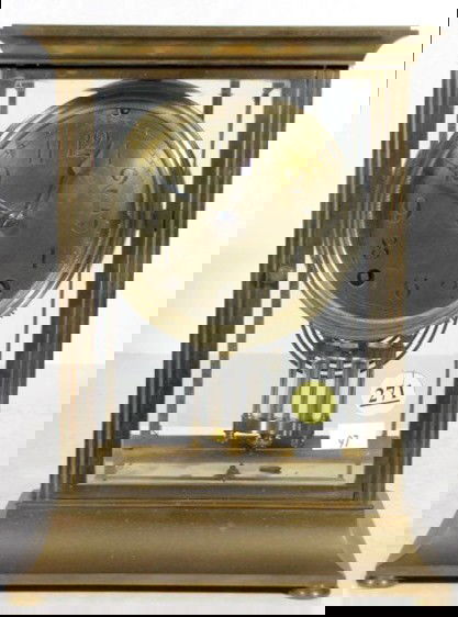 Seth Thomas Crystal Regulator: Seth Thomas Crystal Regulator: 8 day time with gong strike and brass 4 1/2" dial. The 2 tube pendulum is slug filled. In a brass and beveled glass case. (Not running, both springs are wound tight.) 9