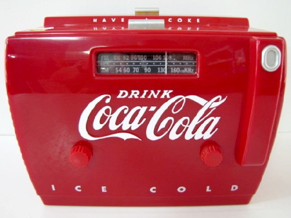 Old-Tyme Coca Cola Cooler Radio: Old-Tyme Coca Cola Cooler Radio: model #OTR 1949, made by Randix Industries Ltd. The top lifts and there is a cassette player and storage area. No condition problems. 9 1/2" x 12" All items sell As Is