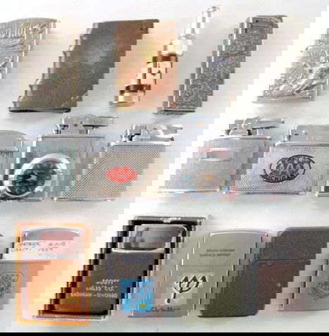 Group of 12 Novelty & Other Lighters: Group of 12 Novelty & Other Lighters 1.) Stam silver flip top, marked silver. 2.) Japan with engraved metal sides. 3.) Zephyr flip top, textured. 4.) Sharp flip top, Mather AF Base California 5.) Bott