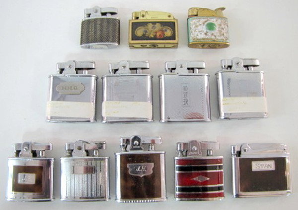 12 Lighters w/Visible Strikers: Ronson & Others: 12 Lighters w/Visible Strikers: 1.) 3 Ronson with tortoise shell inserts and engraved names. 2.) Kent with red, black and chrome horizontal stripes. 3.) Ralite with screen mesh cover. 4.) Unmarked wit