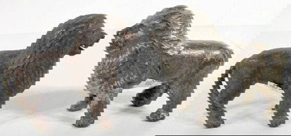 2 A C Williams Lion, Tail Right C.I. Banks: 2 A C Williams Lion, Tail Right C.I. Banks: 1.) Painted silver over gold. (Paint worn.) 4" x 5 1/4" 2.) No paint at all, mane appears smoother. 3 3/4" x 4 1/4" In as played with condition. All items s