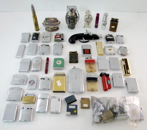 Group of 50 Lighters, Including Some Parts: Group of 50 Lighters, Including Some Parts: there are several figurals, hand grenade, knight, bullet and a cap & ball pistol. The others include a variety of styles, flip top, squeeze side, and others
