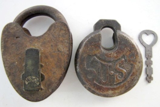 2 Vintage Padlocks: Railroad & Army: 2 Vintage Padlocks: 1.) W& Co. heart shaped padlock; looks like lettering on the back, but very hard to read. (Corroded, no key.) 2.) U. S. Army with key, works. (Both shows use.) All items sell As Is