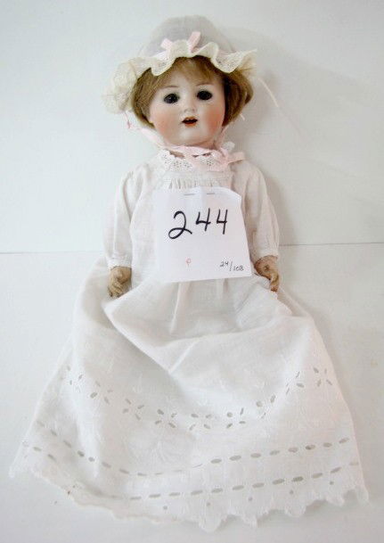 Bisque Socket Head M. Handwerk Bebe Elite Doll: Bisque Socket Head M. Handwerk Bebe Elite Doll: marked Max Handwerk Bebe Elite B 90/136 2 Germany; sleep blue eyes; with hair eyelashes; open mouth with felt tongue; bent limb composition body. (Arms