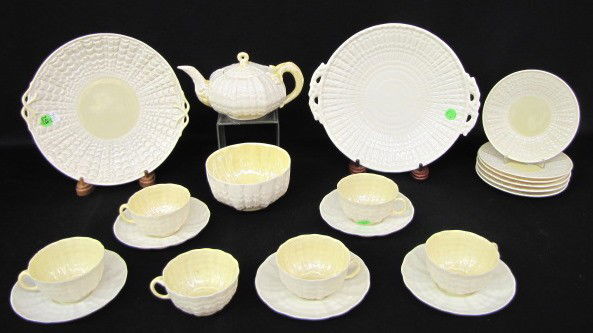 Group of 21 Irish Belleek Items: 21 Irish Belleek Items: 1.) Limpet bread plate; 3rd green mark,11". The rest listed are similar to, but slightly different than Limpet. 2.) Teapot; 3rd green mark, 6". 3.) 6 saucers; 2nd green mark, 6