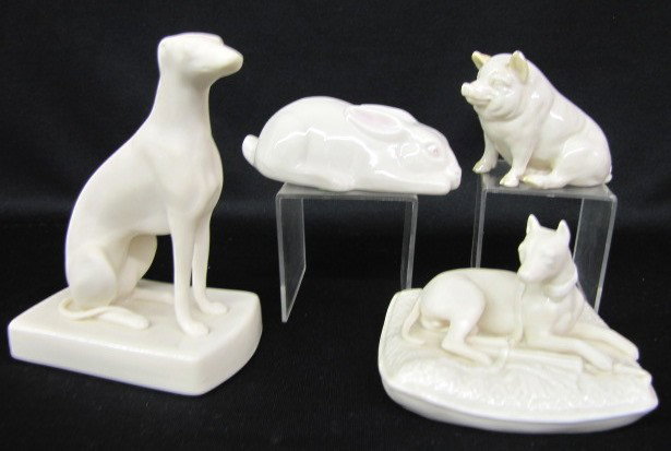 4 Irish Belleek Animal Figures: Dogs, Pig, Rabbit: 4 Irish Belleek Animal Figures: 1.) Seated unglazed Whippet, the base is glazed; marked with 3rd green mark, 6 1/4". 2.) Boxer on cushion, also unglazed; with 3rd green mark, 3 1/4" x 4 3/4" x 3 3/4".