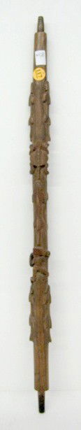 Native American Indian Carved Wood Pipe Stem: Native American Indian Carved Wood Pipe Stem: the high relief figures of fish, a turtle and a man. Holds a large ring shape in one hand and a smaller ring shape in the other hand. Formed as if he is c