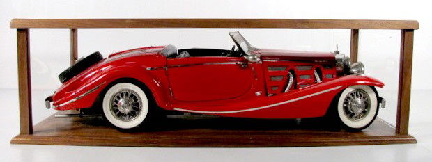 Red Mercedes Benz Convertible Model Car: Red Mercedes Benz Convertible Model Car: convertible sports car with an inline 8 cylinder engine, rumble seat and spare tire. Made from a kit produced in Belgium. Made of hard plastic, metal and other