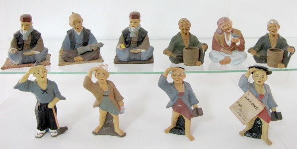 10 Japanese Hakata Clay Figures: 10 Japanese Hakata Clay Figures: 1.) Has a Hakone paper tag and is described as an Old Man Courier. 7" (Hat is chipped) 2.) 3 standing men: a courier; with a large hammer; a drunkard. In the 6 1/2" ra