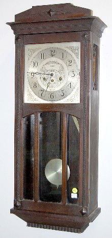 Herschedes Carl W. Mouch Chime Wall Clock: Herschedes Carl W. Mouch Chime Wall Clock: metal dial marked Herschedes, Carl W. Mouch, Champaign, ILL, Canterbury Westminster; time and strike with alarm; has pendulum and key; dark case. (Winds, but