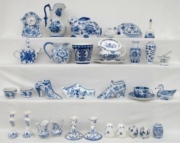 33 Contemporary Blue & White China Collectibles: 33 Contemporary Blue & White China Collectibles/Decorations: 1.) 6 figural cat, rabbit, duck and 3 shoes. 2.) 2 pairs of candlesticks. 3.) 2 salt and pepper shakers. 4.) Gravy boat and under plate. 5.