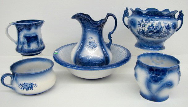 6 Blue & White China Chamber Set & Kitchen Pieces: 6 Blue & White China Chamber Set & Kitchen Pieces: 1.) Ironstone USA molded wash bowl, no decoration. (Minor roughness.) 2.) Ironstone USA molded pitcher with rose decoration. 3.) Unmarked jardiniere 