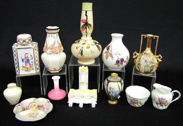 12 Bone China & Other China Cabinet Items: 12 Bone China & Other China Cabinet Items: 1.) Royal Worcester "Arden" fruit decorated vase, 1974. 2.) Paragon bone china milk and mush, floral. 3.) Paragon bone china polka dot vase. 4.) French Orien