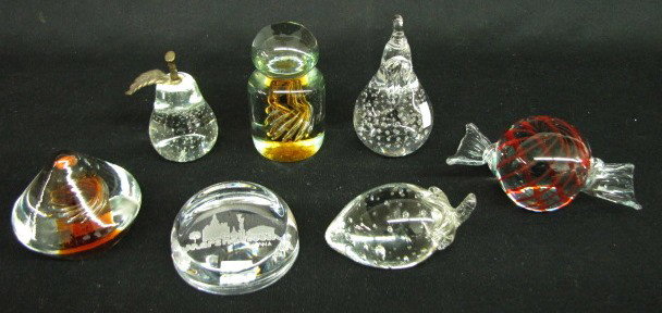 Group of 7 Art Glass Figural Paperweights: Group of 7 Art Glass Figural Paperweights: 1.) Unmarked clear pear with bubbles and metal stem and leaf. 2.) Marked George Good paper label clear glass pear with controlled bubbles. 3.) Dated Jan 74 c