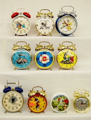 1960's-1990's Group of 10 Alarm Clocks: Group of 10 Alarm Clocks: 1960's-90's; 5 are animated; 9 are bell tops; 1 has original box. Alvin & the Chipmunks; Dallas Cowboys; KSU Big 8; soccer; steamboat; airplanes; train; ducks; cowboy. All it