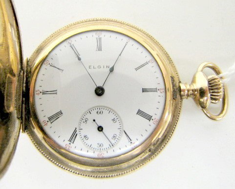 Elgin 7J 6S Fancy Hunting Case Pocket Watch: Elgin 7J 6S Fancy Hunting Case Pocket Watch: serial # 12276350; running at this time. All items sell As Is, Where Is, no guarantees of any kind. We accept Mastercard & Visa, no paypal, no personal che