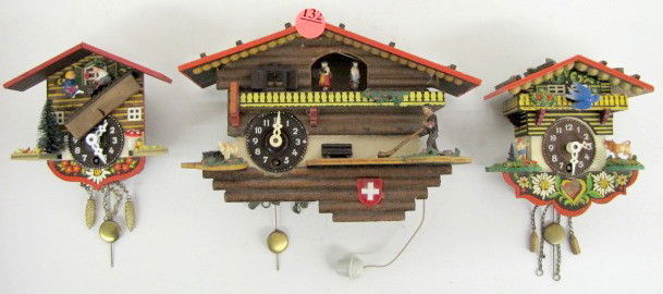 3 German & Swiss Musical Cottage Pendulettes: 3 German Cottage Pendulettes: 1 musical Swiss; 1 Linden; 1 West Germany. (Ledge is off the clock with a mushroom on it.) Largest 5" All items sell As Is, Where Is, no guarantees of any kind. We accept