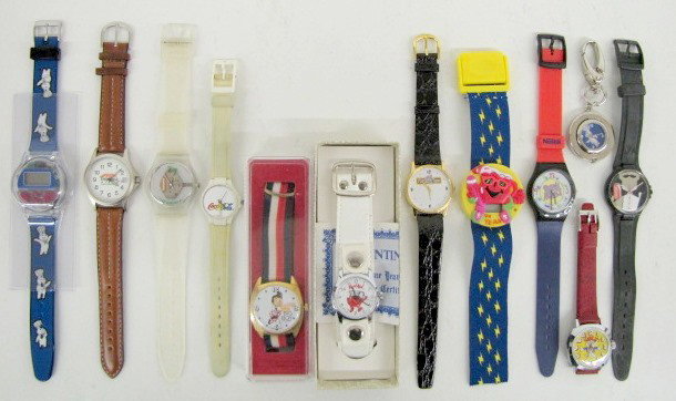 12 Food & Drink Advertising Wrist Watches: 12 Food & Drink Advertising Wrist Watches: 1.) Hawaiian Punch "Punchy"; original box. 2.) Pepperidge Farm; black strap. 3.) 2 Coca Cola (The white one is missing the crystal.) 4.) Nestle Dennis the Me