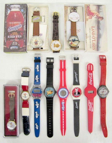 10 Food & Drink Advertising Watches & 1 Other: 10 Food & Drink Advertising Wrist Watches & 1 Other: 1.) Coca Cola ink pen shaped like a w.w. 2.) Coca Cola w.w.; red plastic strap. 3.) Kool Aid w.w; plastic strap. 4.) Pepsi emblem w.w.; "You've Got