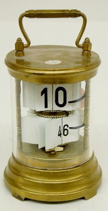 Brass Plato Clock Dated 1903: Brass Plato Clock: with glass cylinder; tab wind; dated 1903. 6" and running at this time All items sell As Is, Where Is, no guarantees of any kind. We accept Mastercard & Visa, no paypal, no personal