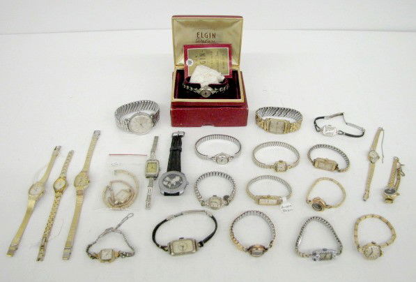 Group of 23 Men's & Women's Wrist Watches: 23 Men's & Women's Wrist Watches: 4 Pulsar; 6 Bulova; 13 Elgin. Not tested for running condition; all sell in as is, as found condition. All items sell As Is, Where Is, no guarantees of any kind. We a