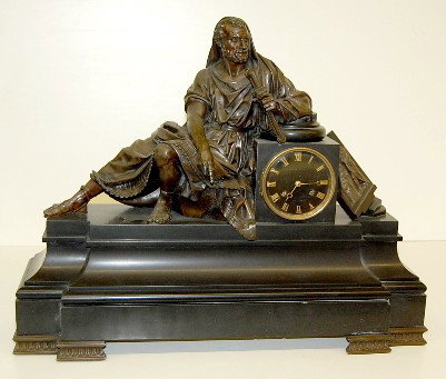 LeRoy French "St. Paul" Statue Clock: LeRoy French "St. Paul" Statue Clock: movement marked LeRoy, Paris; bronze statue on black marble base; 8 day; time and strike; black onyx dial; brass numbers and hands; bronze not signed; has pendulu