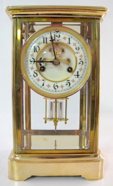 Waterbury 8 Day Crystal Regulator Clock: Waterbury 8 Day Crystal Regulator Clock: strikes hour and half hour; open escapement; porcelain dial; square beveled glass; circa 1895-1910. 10 7/8" All items sell As Is, Where Is, no guarantees of an