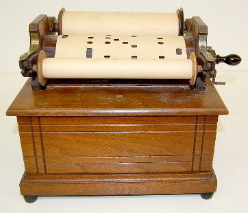 Walnut Antique Roller Organ: Walnut Antique Roller Organ: hand crank; appears all original. 10 1/2" x 12" x 10" All items sell As Is, Where Is, no guarantees of any kind. We accept Mastercard & Visa, no paypal, no personal checks