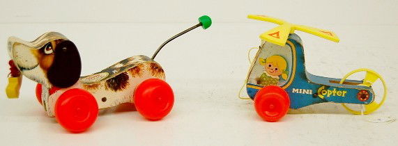 2 Fisher Price Pull Toys: Dog & Helicopter: - 2 Fisher Price Pull Toys: 1.) Little Snoopy #693; all original. 2.) Mini-Copter #448; all original. (Both in played with condition.) Longest 11" All items sell As Is, Where Is, no guarantees of any