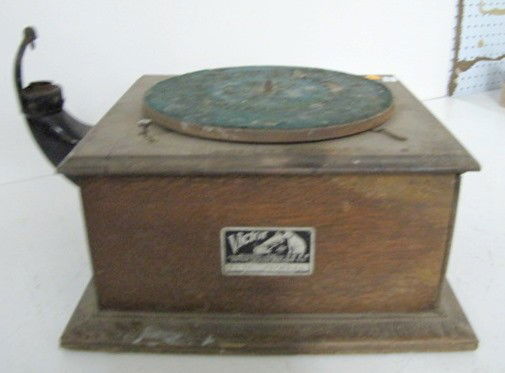 Antique Oak Victor Talking Machine, 10 3/4": Victor Talking Machine, 10 3/4": not complete. (Metal parts corroded; wear to case; needle arm missing; screws missing on handle plate; wood bad at base corners.) 10 3/4" x 13 1/4" All items sell As I