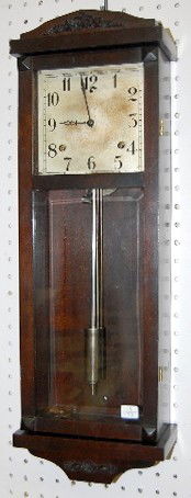 Mahogany Gilbert Wall Hanging Antique Clock: Mahogany Gilbert Wall Hanging Antique Clock: time and strike with a 2 bar strike; 5 1/2" marked metal dial; has key; cylinder pendulum; very similar to a Gilbert "Diego" case; not tested for running c