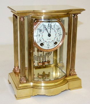 Seth Thomas "Empire 65" Crystal Regulator: Seth Thomas "Empire 65" Crystal Regulator: time and strike; 3 3/4" floral decorated porcelain dial; marked movement; has pendulum; no key; beveled glass. (Time wound tight; does chime on hour and half