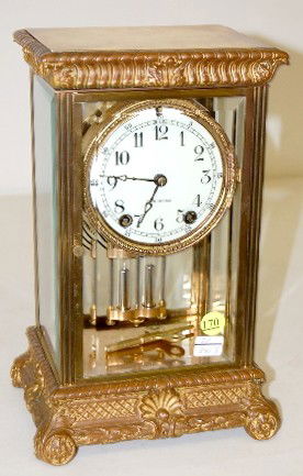 Seth Thomas Empire No. 14 Crystal Regulator: Seth Thomas Empire No. 14 Crystal Regulator:3 3/4" marked porcelain dial; time and strike; has key and pendulum; beveled glass; marked movement; hour and half hour strike. (Not running; strike sounds