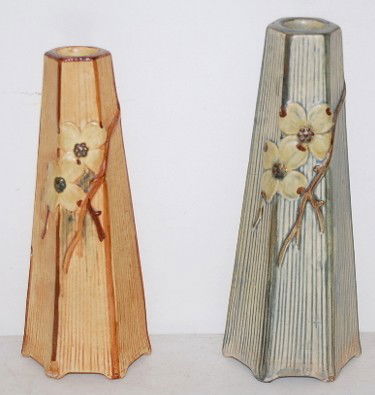 2 Weller Pottery "Klyro" Floral Bud Vases: 2 Weller Pottery "Klyro" Floral Bud Vases: 1.) Incised mark, green with green dogwood flowers.No condition problems. 2.) Incised mark with black 14x, light brown with dogwood flowers. (A slice off the