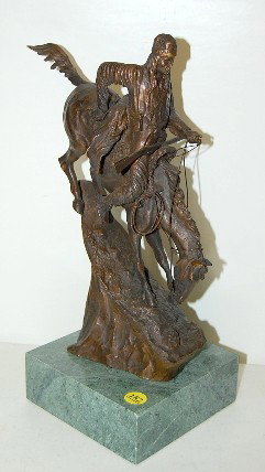 Frederic Remington Bronze, Mountain Man on Horse: Frederic Remington Bronze, Mountain Man on Horse: Rider and horse riding down steep mountain; green marble base; nice details, patina and signature. 14" x 5 3/4" All items sell As Is, Where Is, no gua