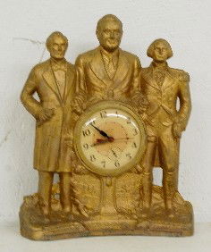 Metal Figural "Steersman" Clock: Metal Figural "Steersman" Clock: depicting Abraham Lincoln, FDR. and George Washington (Movement is loose in case.) All items sell As Is, Where Is, no guarantees of any kind. We accept Mastercard & Vi