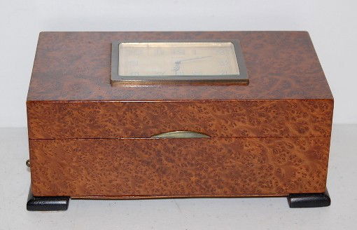 8 Day French Jewelry Box Clock: 8 Day French Jewelry Box Clock: Blum Coussignac & Co., France; 6-8 Jours; 2 adjustments; illuminated hands; w/key. 3 1/4"T x 8"W x 5" D. All items sell As Is, Where Is, no guarantees of any kind. We a