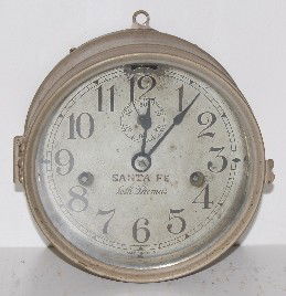 Seth Thomas Santa Fe Clock: Seth Thomas Santa Fe Clock: with seconds bit; T & S; partial label. 6 1/2" (Roughness.) This lot is in rough, as is, as found condition. All items sell As Is, Where Is, no guarantees of any kind. We a