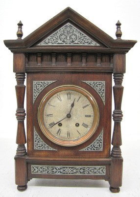 Lenzkirch Wood & Inlaid Metal Shelf Clock: Lenzkirch Wood & Inlaid Metal Shelf Clock: signed movement; T&S; silvered dial. (Dial is tarnished; case has some roughness.) 19" All items sell As Is, Where Is, no guarantees of any kind. We accept M