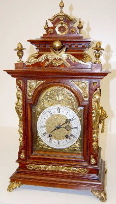 Ornate Lenzkirch Bronze Mounted Shelf Clock: Ornate Lenzkirch Bronze Mounted Shelf Clock: marked movement "Lenzkirch 405401, 55"; has key and pendulum; brass decoration including clock top and finials; lion heads; helmeted winged ladies, helmets