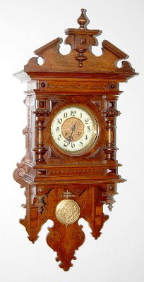 Ornate Antique Walnut Free Swinger Clock: Ornate Antique Walnut Free Swinger Clock: porcelain dial; T&S; married top. All items sell As Is, Where Is, no guarantees of any kind. We accept Mastercard & Visa, no paypal, no personal checks, no mo