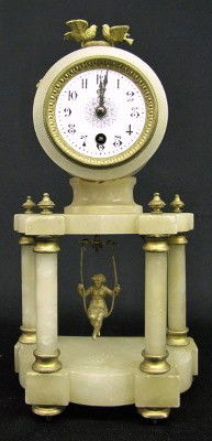 French Alabaster To and Fro Clocks W/ Girl: French Four Column Alabaster To and Fro Clocks W/ Girl: porcelain dial; time only; birds on nest. (Minor expected roughness; the top has been broken on this clock.) 14 1/2" All items sell As Is, Where