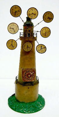 Nine Time Zone Antique Lighthouse Clock: Nine Time Zone Antique Lighthouse Clock: painted tin dial; movement not marked; no pendulum; has dials for Amsterdam, Peking, Greenwich, Petersburg, Paris, San Francisco, New York and Madrid; wooden l