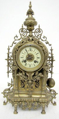 Ornate French Bronze Antique Shelf Clock: Ornate French Bronze Antique Shelf Clock: Time and strike, porcelain dial; ornate case; movement marked 762. 18" All items sell As Is, Where Is, no guarantees of any kind. We accept Mastercard & Visa,