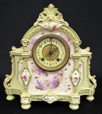 Antique Royal Bonn "Wyandotte" China Clock : Antique Royal Bonn "Wyandotte" China Clock: floral painted with violas, violets and lilacs; porcelain and metal dial; beveled glass; movement marked U.S. Patent Series 90 Jan 19-92; partial paper labe